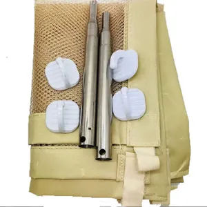 Detailed view of portable beige pet mesh gate set including poles and adhesive hooks