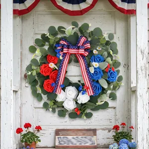 Patriotic Independence Day wreath with red white blue flowers for front door decoration
