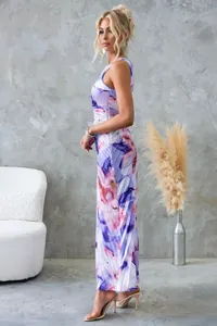 Elegant side view of a purple floral print one-shoulder pleated maxi dress for women