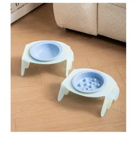 Elevated ceramic pet bowl set with tilted acrylic stands and slow feeder