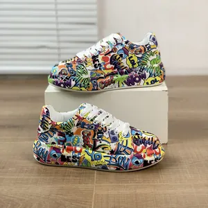 Vibrant graffiti print chunky platform sneakers for women with colorful comic patterns