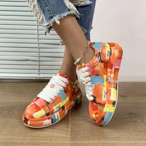 Vibrant colorful graffiti painted platform sneakers with white laces for women
