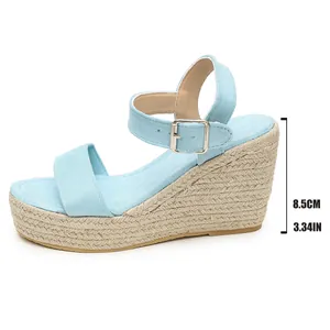 Stylish light blue espadrille wedge sandals with 8.5cm high heel and ankle strap buckle