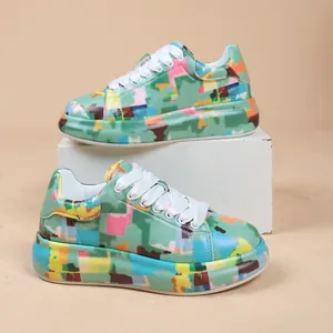 Macro view of artistic graffiti pattern on these comfortable platform sneakers.