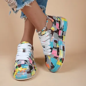 Detail view of colorful graffiti pattern on comfortable thick sole sneakers for women