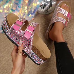 Detail of women's sparkly rhinestone double buckle cork platform slide sandals