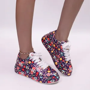 Fashionable graffiti print sneakers for women featuring skull and floral pattern designs