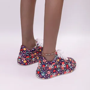 Vibrant sugar skull graffiti chunky sneakers for women with white laces and platform