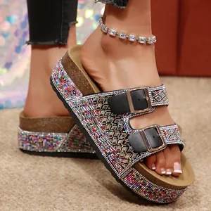 Detail shot of sparkling rhinestone and colorful bead wrap on cork platform sandals