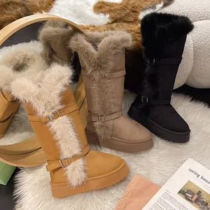 Detail of tall snow boots with faux fur trim and buckles in multiple colors