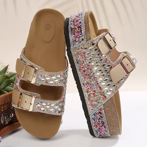 Detailed view of sparkling rhinestones and colorful beads on platform cork sandals