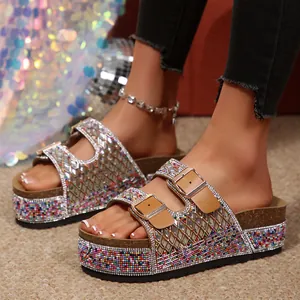 Detailed view of women's platform sandals with colorful rhinestones and beads