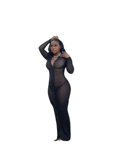 Full length view of a sexy black sheer mesh dress featuring buttons and deep V-neck