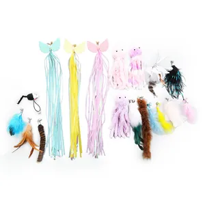 Colorful cat toy teaser wand replacement heads collection with feathers and tassels.