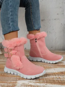 Cozy pink plush snow boots with buckle details and thick white anti-slip soles