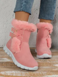 Stylish pink women's winter snow boots featuring faux fur trim and platform soles