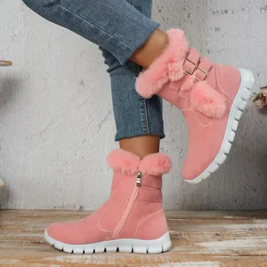 Cozy pink women's snow boots with plush faux fur trim and durable platform soles