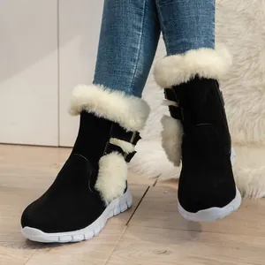 Warm women's black suede snow boots with white faux fur trim and thick anti-slip soles