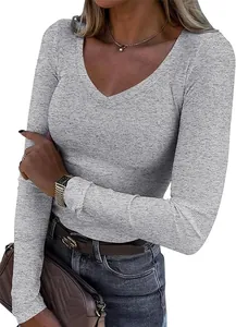 Close-up of women's grey slim-fit ribbed long sleeve t-shirt with deep V-neck design