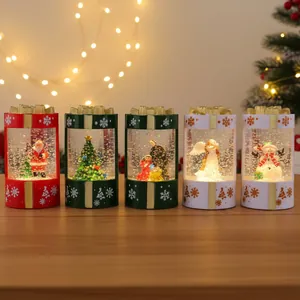 Festive Christmas light-up snow globe gift box ornaments with Santa and snowman designs