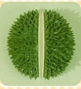 Detailansicht einer grünen Katzenmassagebürste in Durian-Form mit Silikonspitzen