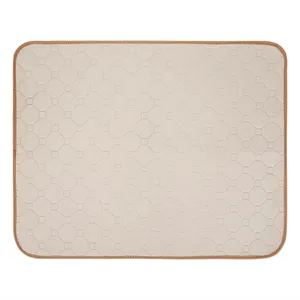 Close-up detail of machine washable reusable pet pee pad with quilted pattern design