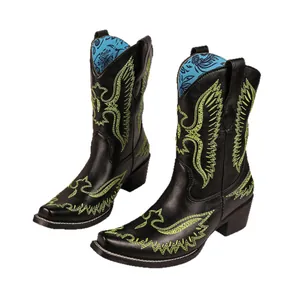 Bottes de cowboy noires vintage pour femmes avec broderies vert fluo et talons blocs.
