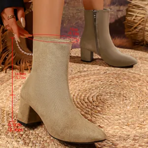 Detail view and measurements of women's suede block heel ankle boots with side zipper