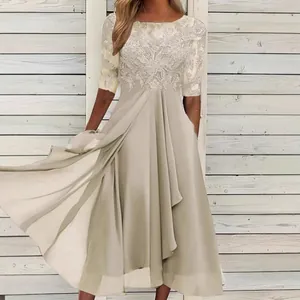 Elegant champagne midi dress featuring delicate lace bodice and flowing chiffon skirt