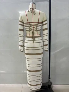 Back detail view of striped crochet two-piece set with lace-up halter top