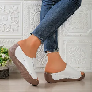 White women's platform wedge sandals with fish mouth design and thick brown sole