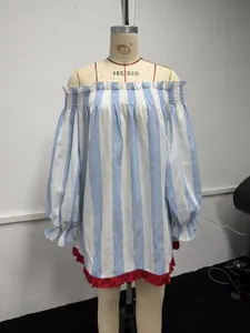 Front view of blue and white striped off-the-shoulder ruffle dress on mannequin.