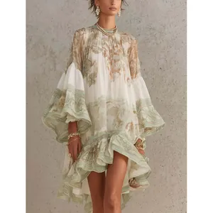 Elegant floral ruffled mini dress with wide flared sleeves and flowing resort style.