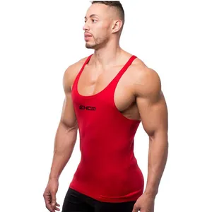 Detail view of a red slim fit men's fitness tank top showing its athletic cut.