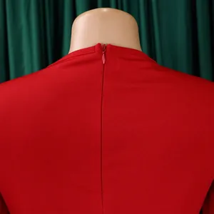 Close-up detail of the red bodycon office dress showing the back neck and hidden zipper