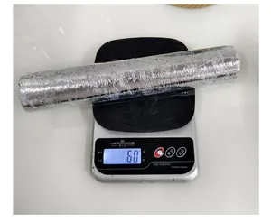 Macro view showing 60g weight of silver bronzing mesh roll runner.