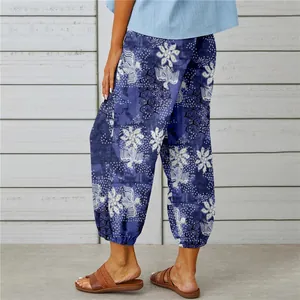 Detailed back view of women's retro floral print cotton linen cropped harem pants