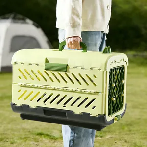 Portable foldable pet carrier for cats and dogs shown in outdoor camping scenario