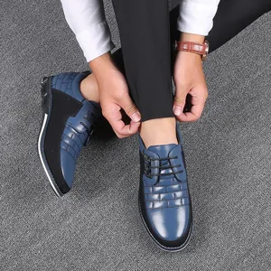 Men's stylish blue and black casual dress shoes with textured pattern and front lace-up design