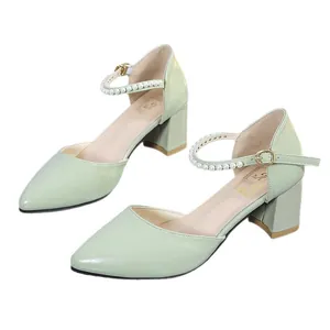 Elegant light green pointed-toe block heel pumps with pearl-embellished ankle straps