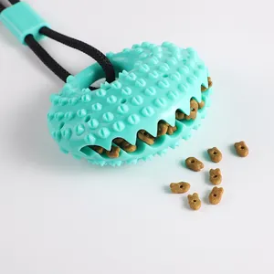 Mint green textured silicone pet chew toy and treat dispenser for dog dental care