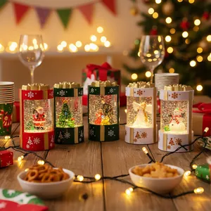 Festive Christmas glowing snow globe gift box lanterns with assorted winter scenes
