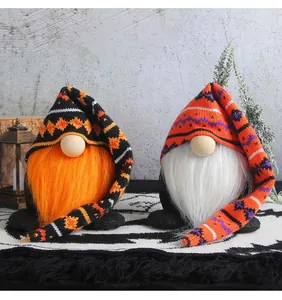 Two handmade Halloween plush gnomes with knitted long hats for tabletop decoration