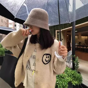 Korean-style round neck knit cardigan with smiley face embroidery in beige color