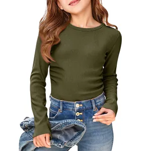 Girl wearing olive green long sleeve ribbed T-shirt with denim jeans on white background