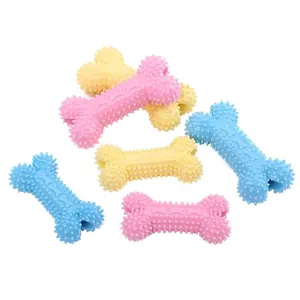 Assorted spiky TPR bone-shaped dog chew toys for teething in pink yellow and blue colors