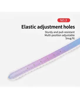Close-up of adjustable holes on a gradient pet collar with scalloped soft edge