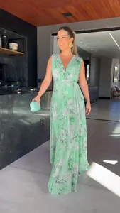 Elegant mint green floral chiffon maxi dress with deep V-neckline and flowy skirt for summer