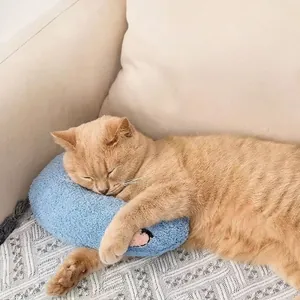 Weiches blaues Plüsch-U-Kissen für Katzen für bequemen und tiefen Haustierschlaf zu Hause