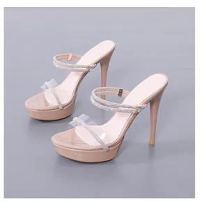 Detailed view of elegant nude high heel sandals with sparkly rhinestone straps and platform